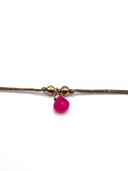Pink agate bracelet on black and gold cord
