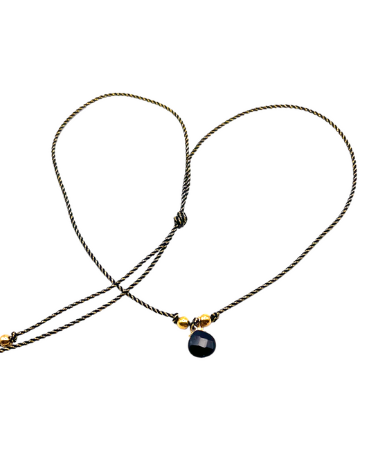 Onyx necklace on black and gold cord.