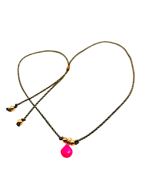Pink agate necklace on black and gold cord.